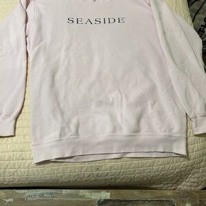 Pink Women's Sweatshirt size Medium. Used has a spot on one sleeve